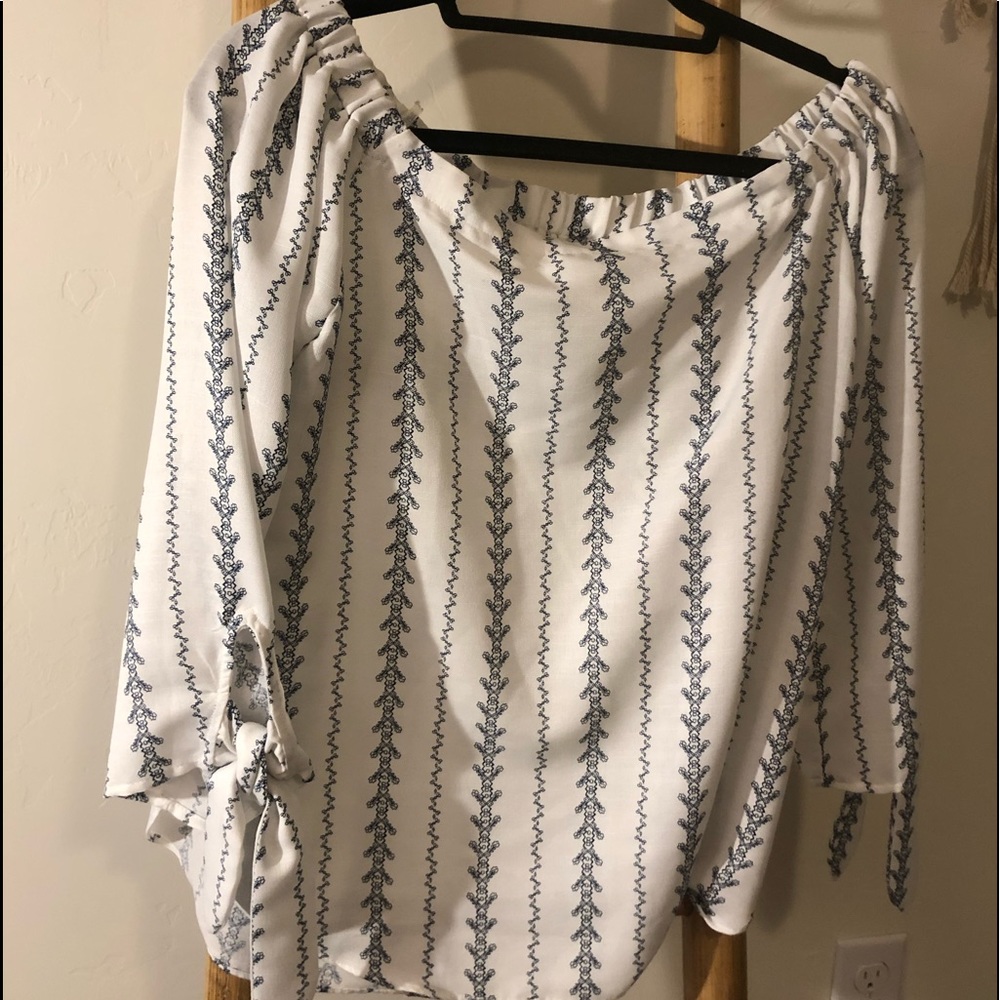 Off-the-shoulder blouse with flowy sleeves